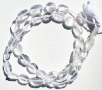 16 inch strand of 10x7mm Flat Oval Quartz Crystal